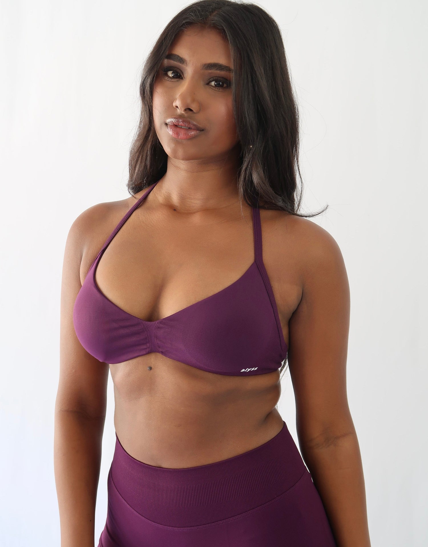 Ignite sports bra in Deep Grape